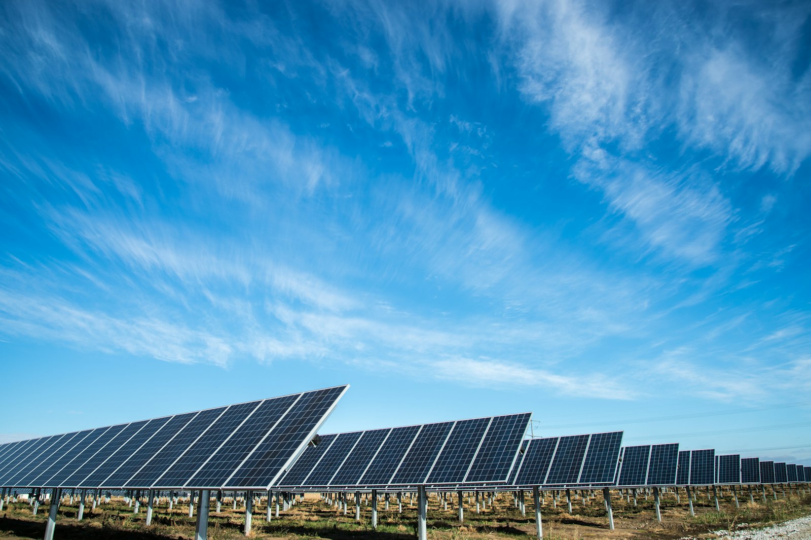 Large-scale solar panel array generating clean energy at sunset across Southern Africa